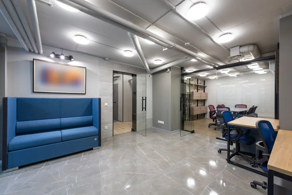 Bright office reception and glass meeting rooms