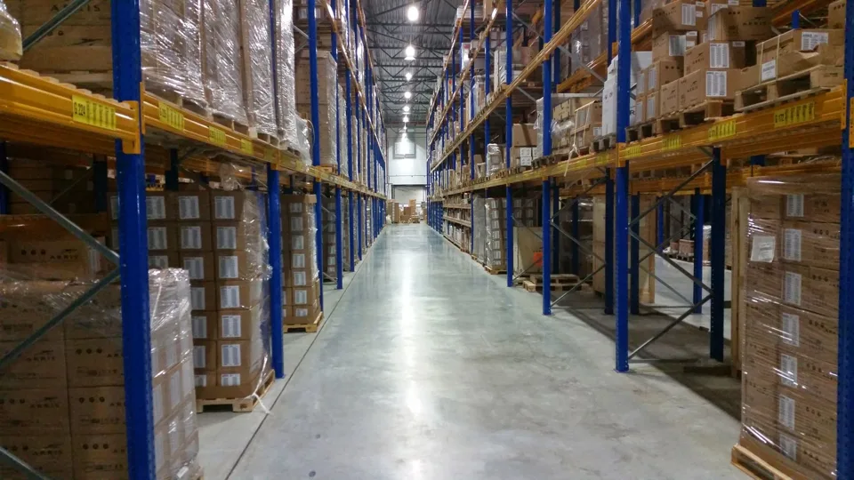 Warehouse aisle between storage racks
