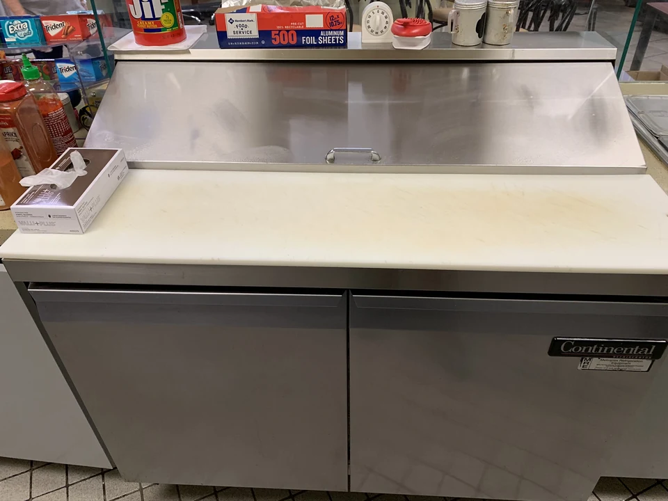 Second preparation-station view, with less visible discoloration on the board